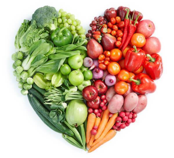 A heart photo made up of fruits and vegetables.